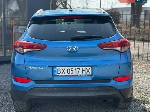 Синій Хендай Туксон, об'ємом двигуна 2 л та пробігом 239 тис. км за 13500 $, фото 5 на Automoto.ua
