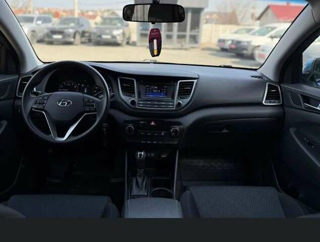 Синій Хендай Туксон, об'ємом двигуна 2 л та пробігом 239 тис. км за 13500 $, фото 6 на Automoto.ua