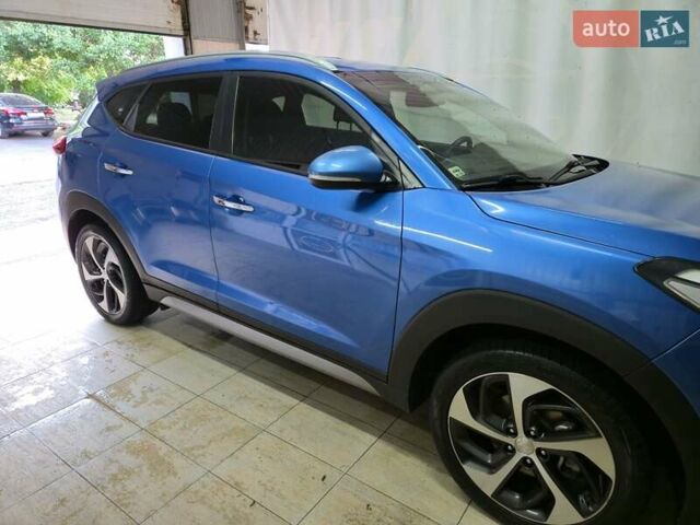 Синий Хендай Туксон, объемом двигателя 1.59 л и пробегом 136 тыс. км за 14300 $, фото 9 на Automoto.ua