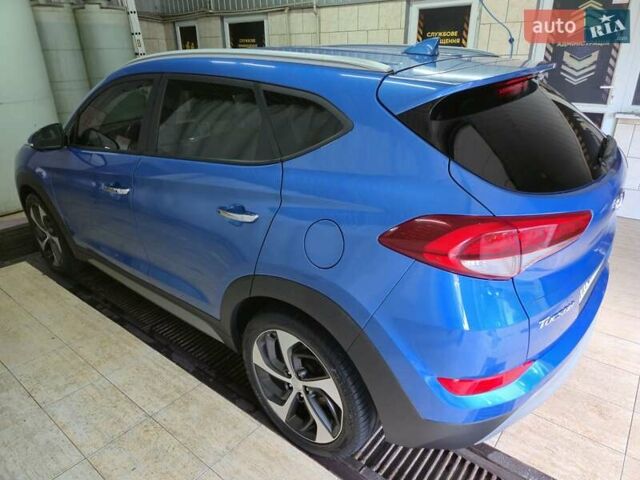 Синий Хендай Туксон, объемом двигателя 1.59 л и пробегом 136 тыс. км за 14300 $, фото 14 на Automoto.ua