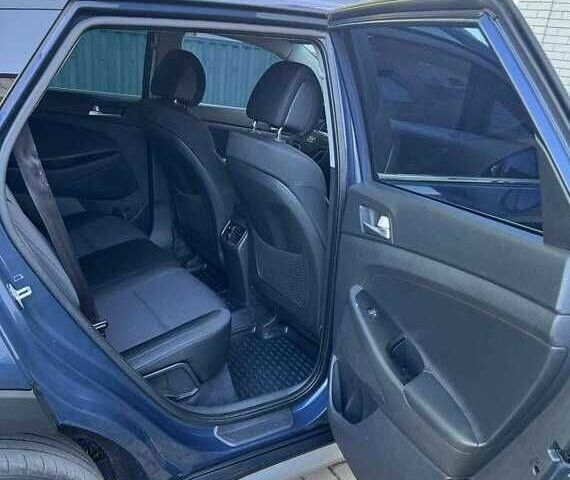 Синій Хендай Туксон, об'ємом двигуна 2 л та пробігом 90 тис. км за 19500 $, фото 4 на Automoto.ua