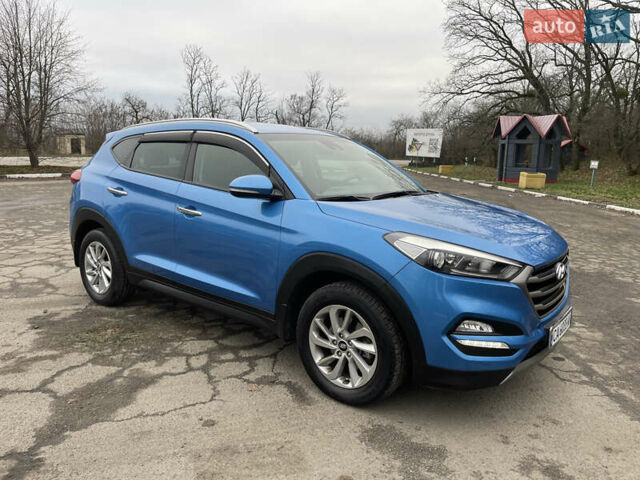 Синий Хендай Туксон, объемом двигателя 1.69 л и пробегом 179 тыс. км за 19300 $, фото 5 на Automoto.ua