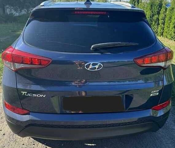Синій Хендай Туксон, об'ємом двигуна 2 л та пробігом 90 тис. км за 19500 $, фото 6 на Automoto.ua