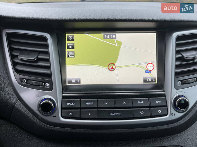 Синий Хендай Туксон, объемом двигателя 1.69 л и пробегом 179 тыс. км за 19300 $, фото 18 на Automoto.ua