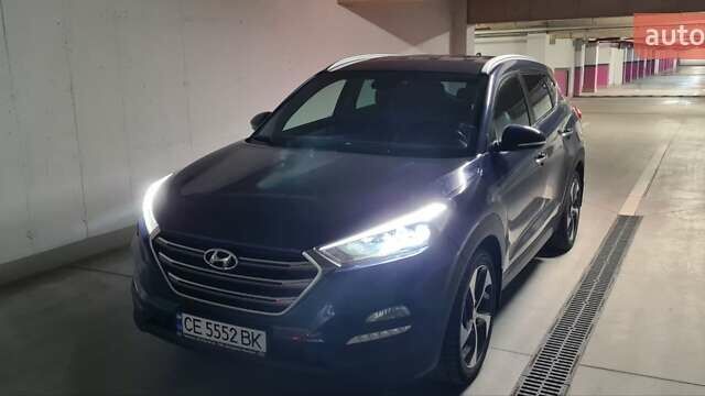 Синий Хендай Туксон, объемом двигателя 2 л и пробегом 150 тыс. км за 23500 $, фото 4 на Automoto.ua