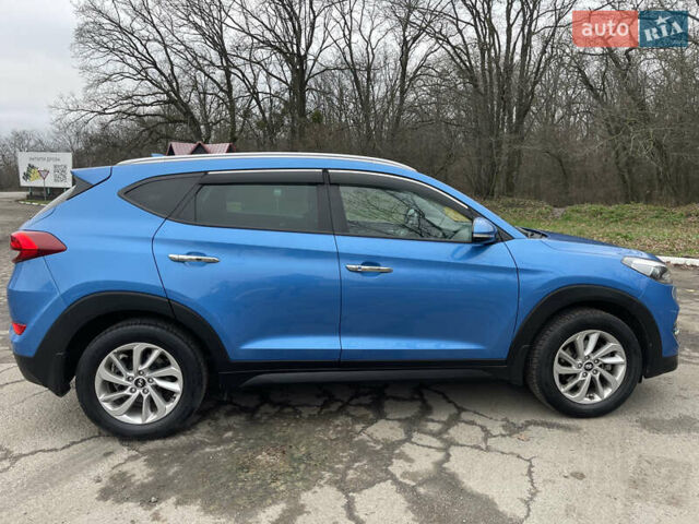 Синий Хендай Туксон, объемом двигателя 1.69 л и пробегом 179 тыс. км за 19300 $, фото 8 на Automoto.ua