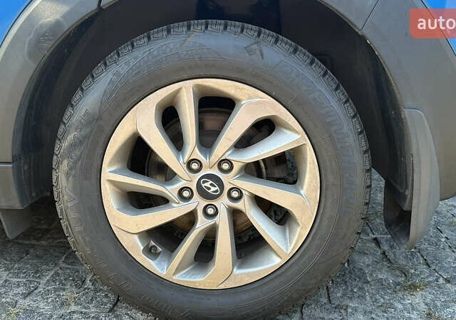 Синій Хендай Туксон, об'ємом двигуна 2 л та пробігом 60 тис. км за 17500 $, фото 23 на Automoto.ua