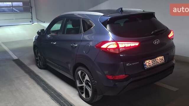 Синий Хендай Туксон, объемом двигателя 2 л и пробегом 150 тыс. км за 23500 $, фото 2 на Automoto.ua