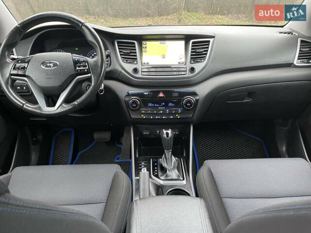 Синий Хендай Туксон, объемом двигателя 1.69 л и пробегом 179 тыс. км за 19300 $, фото 17 на Automoto.ua