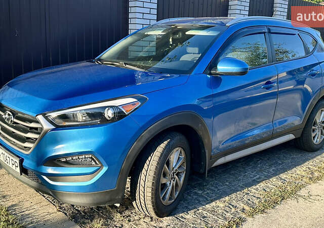Синий Хендай Туксон, объемом двигателя 2 л и пробегом 37 тыс. км за 17500 $, фото 26 на Automoto.ua
