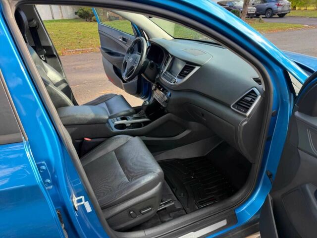 Синий Хендай Туксон, объемом двигателя 1.6 л и пробегом 53 тыс. км за 3500 $, фото 6 на Automoto.ua