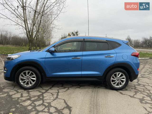 Синий Хендай Туксон, объемом двигателя 1.69 л и пробегом 179 тыс. км за 19300 $, фото 4 на Automoto.ua
