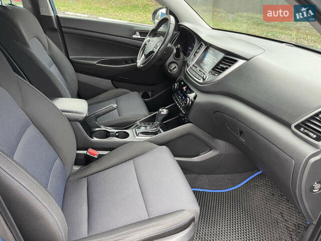 Синий Хендай Туксон, объемом двигателя 1.69 л и пробегом 179 тыс. км за 19300 $, фото 12 на Automoto.ua