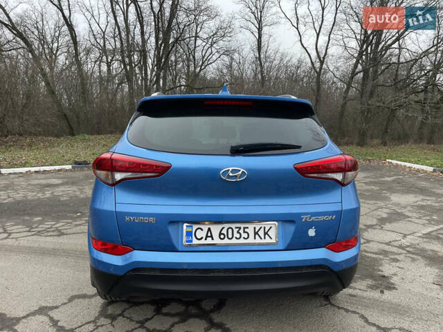 Синий Хендай Туксон, объемом двигателя 1.69 л и пробегом 179 тыс. км за 19300 $, фото 7 на Automoto.ua