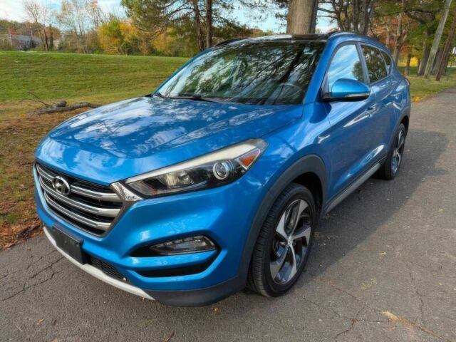 Синий Хендай Туксон, объемом двигателя 1.6 л и пробегом 53 тыс. км за 3500 $, фото 2 на Automoto.ua