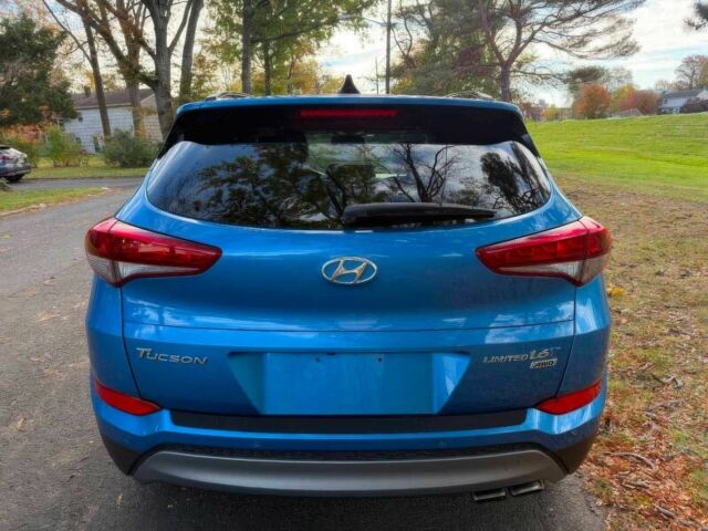 Синий Хендай Туксон, объемом двигателя 1.6 л и пробегом 53 тыс. км за 3500 $, фото 4 на Automoto.ua