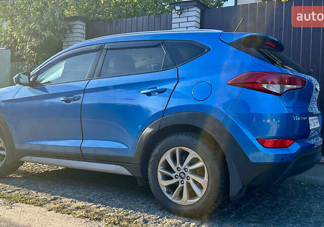 Синій Хендай Туксон, об'ємом двигуна 2 л та пробігом 60 тис. км за 17500 $, фото 27 на Automoto.ua