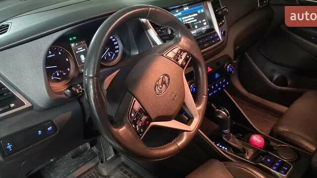 Синий Хендай Туксон, объемом двигателя 2 л и пробегом 150 тыс. км за 23500 $, фото 7 на Automoto.ua