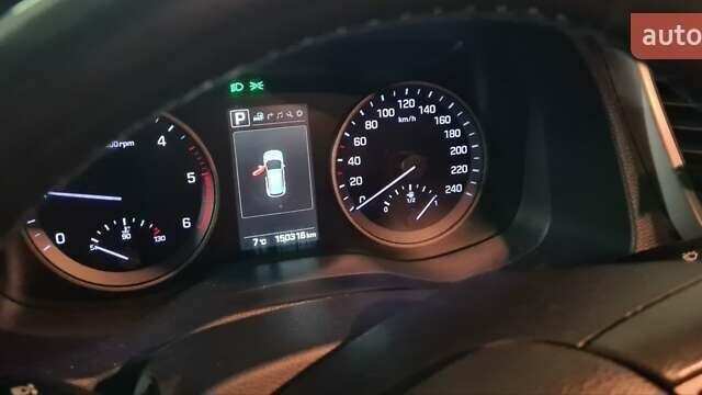 Синий Хендай Туксон, объемом двигателя 2 л и пробегом 150 тыс. км за 23500 $, фото 6 на Automoto.ua