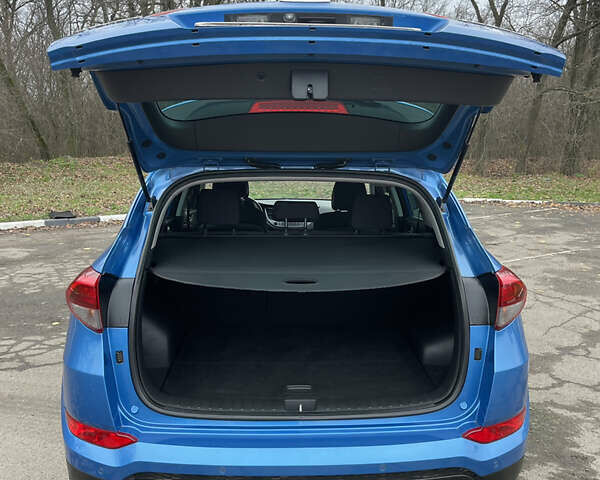 Синий Хендай Туксон, объемом двигателя 1.69 л и пробегом 179 тыс. км за 19300 $, фото 19 на Automoto.ua