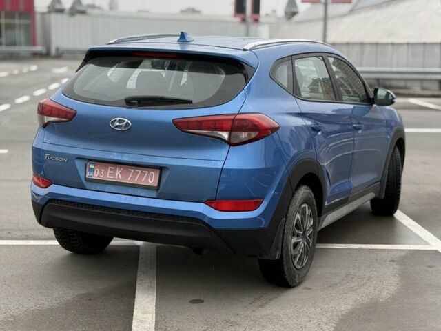 Синий Хендай Туксон, объемом двигателя 2 л и пробегом 58 тыс. км за 17200 $, фото 3 на Automoto.ua