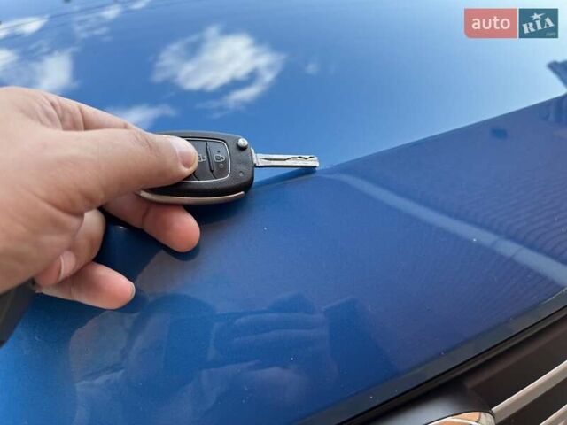 Синій Хендай Туксон, об'ємом двигуна 2 л та пробігом 92 тис. км за 17300 $, фото 26 на Automoto.ua