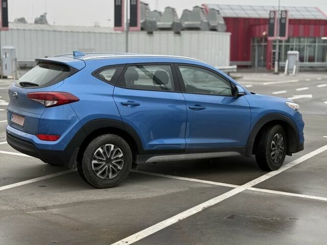 Синий Хендай Туксон, объемом двигателя 2 л и пробегом 58 тыс. км за 17200 $, фото 4 на Automoto.ua