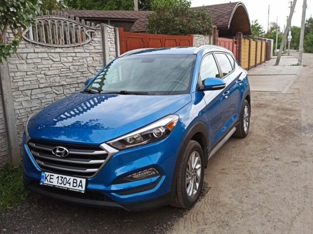 Синий Хендай Туксон, объемом двигателя 2 л и пробегом 99 тыс. км за 17000 $, фото 1 на Automoto.ua