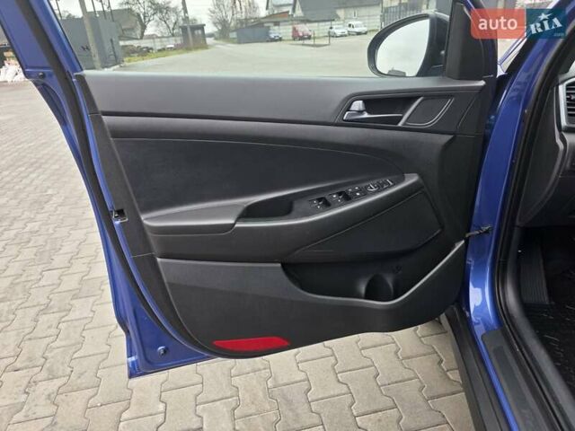 Синий Хендай Туксон, объемом двигателя 1.6 л и пробегом 176 тыс. км за 17800 $, фото 25 на Automoto.ua