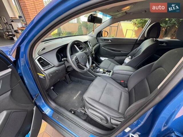 Синій Хендай Туксон, об'ємом двигуна 2 л та пробігом 92 тис. км за 17300 $, фото 3 на Automoto.ua