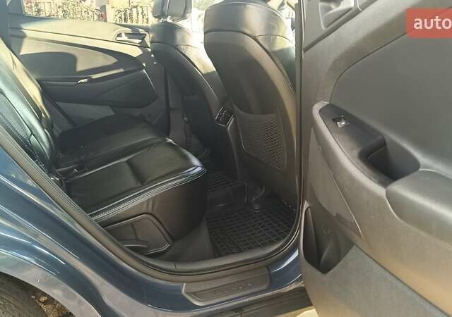 Синий Хендай Туксон, объемом двигателя 2 л и пробегом 83 тыс. км за 17700 $, фото 13 на Automoto.ua