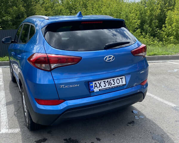 Синій Хендай Туксон, об'ємом двигуна 2 л та пробігом 121 тис. км за 17600 $, фото 5 на Automoto.ua