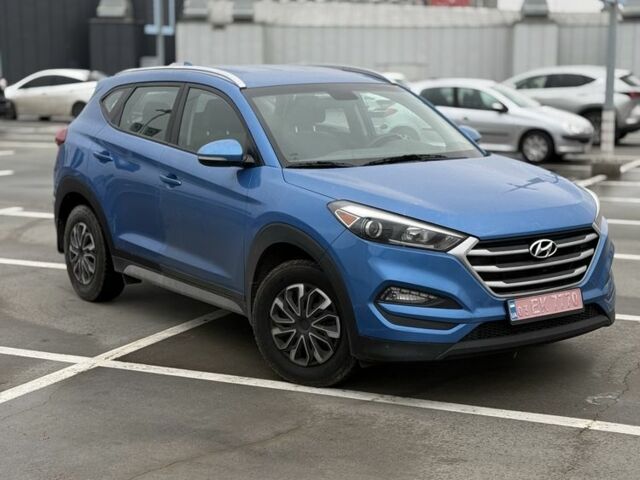 Синий Хендай Туксон, объемом двигателя 2 л и пробегом 58 тыс. км за 17200 $, фото 5 на Automoto.ua