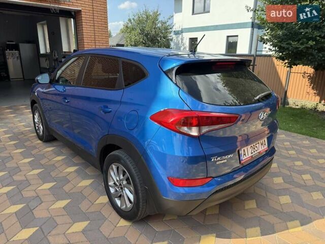 Синій Хендай Туксон, об'ємом двигуна 2 л та пробігом 92 тис. км за 17300 $, фото 4 на Automoto.ua