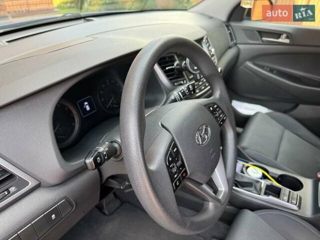 Синій Хендай Туксон, об'ємом двигуна 2 л та пробігом 92 тис. км за 17300 $, фото 8 на Automoto.ua