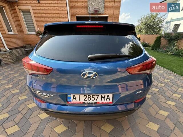 Синій Хендай Туксон, об'ємом двигуна 2 л та пробігом 92 тис. км за 17300 $, фото 1 на Automoto.ua