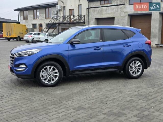 Синий Хендай Туксон, объемом двигателя 1.6 л и пробегом 176 тыс. км за 17800 $, фото 11 на Automoto.ua