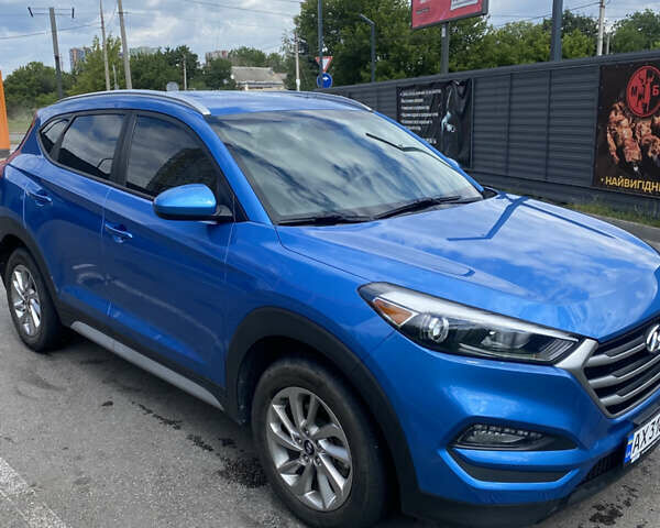 Синій Хендай Туксон, об'ємом двигуна 2 л та пробігом 121 тис. км за 17600 $, фото 2 на Automoto.ua