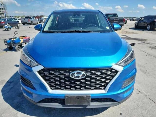 Синий Хендай Туксон, объемом двигателя 1.6 л и пробегом 72 тыс. км за 11000 $, фото 4 на Automoto.ua