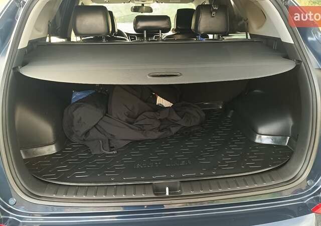 Синий Хендай Туксон, объемом двигателя 2 л и пробегом 83 тыс. км за 17700 $, фото 14 на Automoto.ua