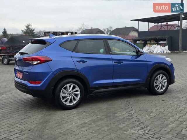 Синий Хендай Туксон, объемом двигателя 1.6 л и пробегом 176 тыс. км за 17800 $, фото 14 на Automoto.ua
