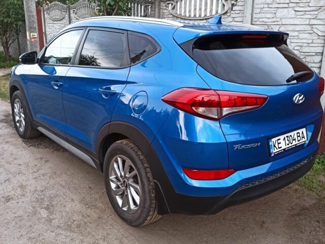 Синий Хендай Туксон, объемом двигателя 2 л и пробегом 99 тыс. км за 17000 $, фото 2 на Automoto.ua