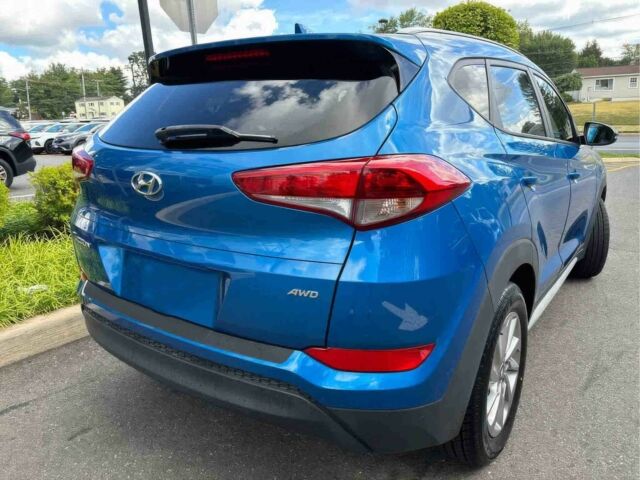 Синій Хендай Туксон, об'ємом двигуна 2 л та пробігом 44 тис. км за 9200 $, фото 4 на Automoto.ua