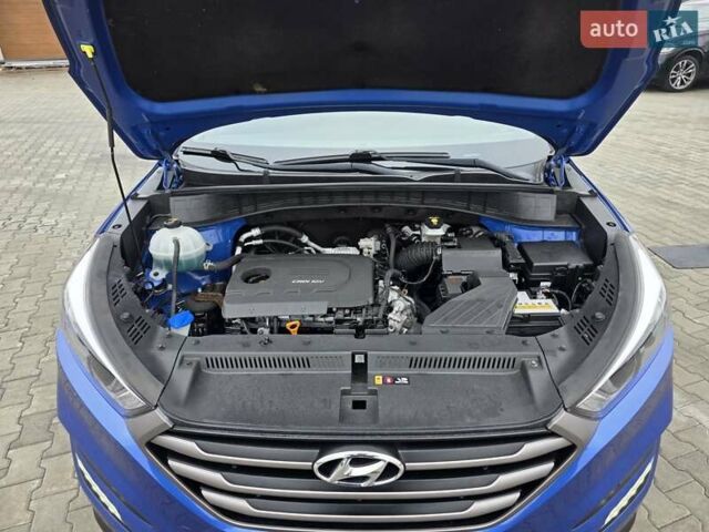 Синий Хендай Туксон, объемом двигателя 1.6 л и пробегом 176 тыс. км за 17800 $, фото 50 на Automoto.ua