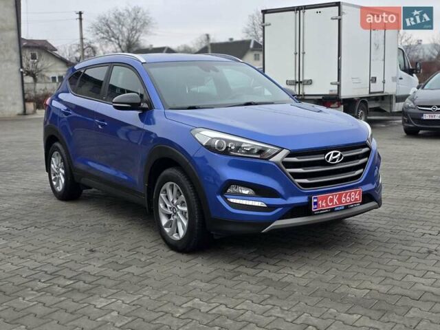 Синий Хендай Туксон, объемом двигателя 1.6 л и пробегом 176 тыс. км за 17800 $, фото 6 на Automoto.ua