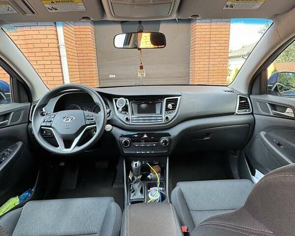 Синій Хендай Туксон, об'ємом двигуна 2 л та пробігом 92 тис. км за 17300 $, фото 7 на Automoto.ua