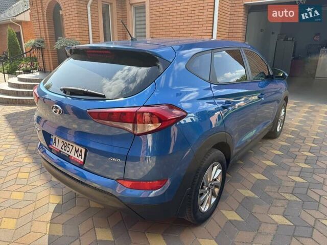 Синій Хендай Туксон, об'ємом двигуна 2 л та пробігом 92 тис. км за 17300 $, фото 5 на Automoto.ua