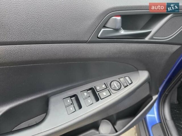 Синий Хендай Туксон, объемом двигателя 1.6 л и пробегом 176 тыс. км за 17800 $, фото 26 на Automoto.ua