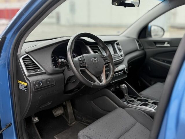 Синий Хендай Туксон, объемом двигателя 2 л и пробегом 58 тыс. км за 17200 $, фото 10 на Automoto.ua