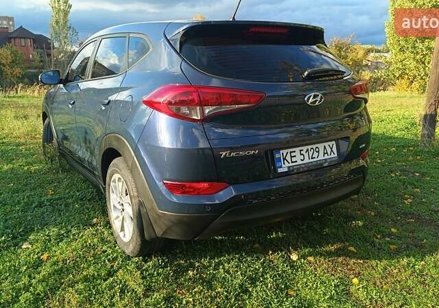 Синий Хендай Туксон, объемом двигателя 2 л и пробегом 83 тыс. км за 17700 $, фото 7 на Automoto.ua